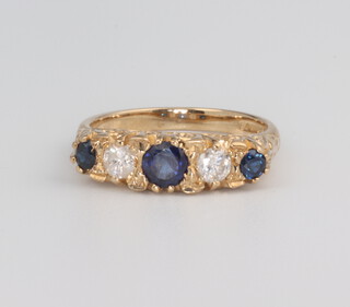 A Victorian style 9ct ring set with 2 diamonds and 3 sapphires, the diamonds 0.36ct, the sapphires 0.70ct, size N, 3.5 grams