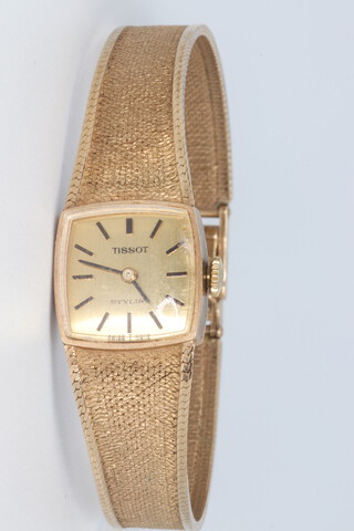 A lady's 9ct yellow gold Tissot wristwatch and bracelet, gross weight including glass 18 grams 