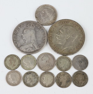 A Victorian 1890 crown, a George V 1935 crown and a collection of minor silver coinage, 72 grams 