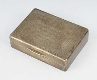 An Art Deco silver engine turned cigarette box with inscription, London 1937, 12cm 