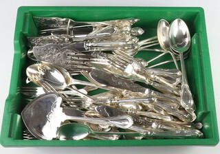 A quantity of silver plated lily pattern cutlery comprising 6 coffee spoons, 6 tea spoons, 6 dessert spoons, 6 soup spoons, 4 table spoons, 2 ladles, 6 dessert forks, 6 dinner forks, 6 cake forks, 6 dessert knives, 6 dinner knives, a basting spoon, a pair of servers, a pair of fish servers, 6 fish knives and forks and a pair of asparagus tongs 