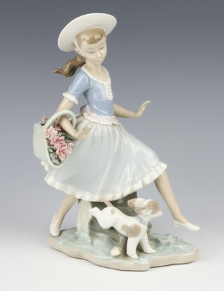 A Lladro group of a girl with basket of flowers and poppy 25cm 