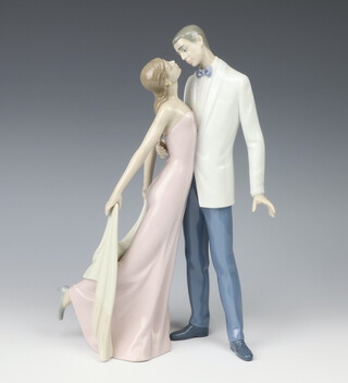 A Lladro group of lady and gentleman in evening dress 29cm 