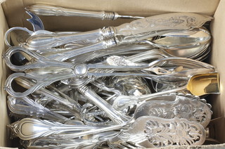 A quantity of silver plated lily pattern utensils including tongs, nips, candle snuffers etc 