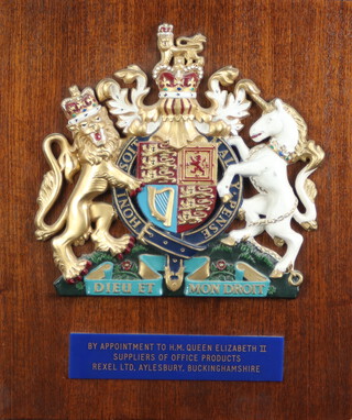 An Elizabeth II plastic royal warrant holders plaque for Rexel Ltd of Aylesbury Bucks 60cm x 52cm 