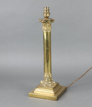 A brass Corinthian column table lamp on a square base 38cm x 15cm x 15cm 