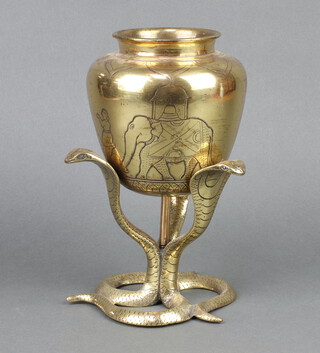 A Benares polished brass vase supported by 3 cobras 25cm x 14cm 
