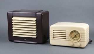 A Champion Bakelite radio no.784 contained in a Bakelite case 16cm x 26cm x 14cm (crack to slide, glass dial cover is missing) together with Ecko Type ES 31 extension speaker in a brown and white Bakelite case 25cm x 30cm x 14cm (some paint loss) 