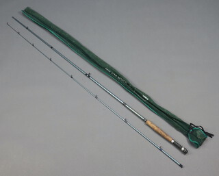 An Alan Pearson "The Baron" 10' 6" two piece fly fishing rod in green cloth bag 