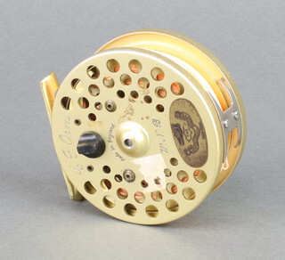 A CFO Orvis Piscotorial Socity Centenary Celebration fishing reel with initials WNB, 3 1/2", with blue pouch 