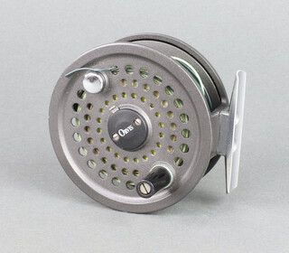 An Orvis Battenkill 8/9 salmon fishing reel with blue cloth pouch 
