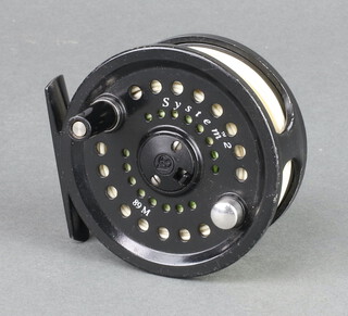 A System 2 DT-8-F fishing reel with cloth case 