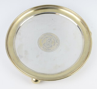 A mid Victorian circular silver presentation salver with engraved inscription to Sir William Jenner Bart. "with the best wishes of his most sincerely T J Wynn" with the recipients coat of arms, raised on ball feet.  Sir William Jenner was physician in ordinary to Queen Victoria in 1862 and in 1863 physician in ordinary to The Prince of Wales for which he was created a Baronet. London 1870, maker George Fox, 24cm, 632 grams 