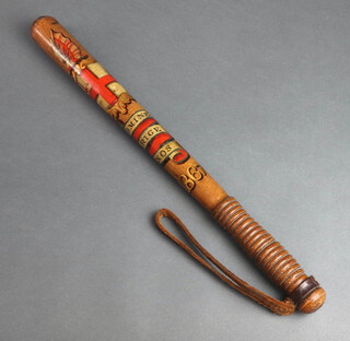 A Victorian City of London Police turned and painted truncheon marked 1867 and impressed with crown and CP, complete with leather thong, 45.5cm l 