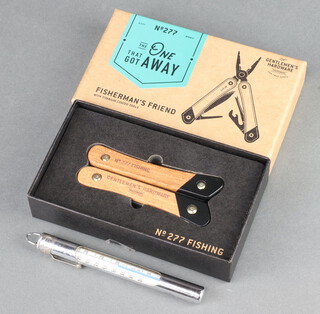 A Hardy hard cased chromed thermometer together with a Fisherman's Friend no.277 fishing multi tool boxed and with paperwork 