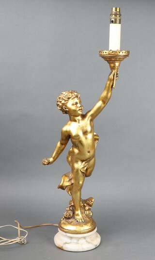 A 1950's gilt resin table lamp in the form of a standing cherub, raised on a circular base 13cm 