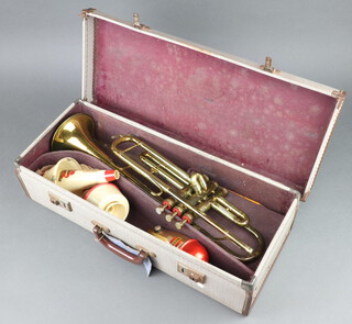 An Embassy trumpet complete with mouthpiece and 3 mutes, contained in a carrying case 