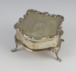 A Victorian shaped trinket box with planished decoration to the lid on cabriole supports, Birmingham 1887 by Walker & Hall, 102 grams 