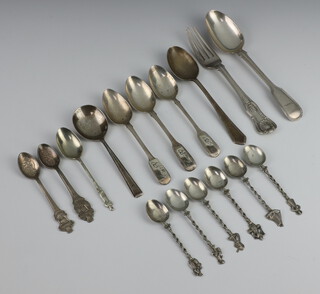 A Victorian silver Queens pattern pudding fork, a fiddle pattern pudding spoon, a jam spoon and 12 various teaspoons, 296 grams 