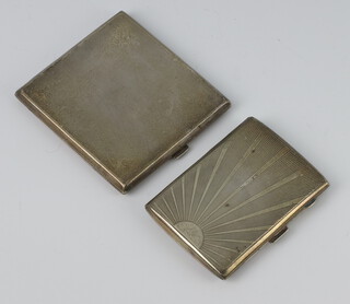 A silver cigarette case with engine turned decoration London 1930, 1 other with sun ray decoration, Birmingham 1930, 204 grams 