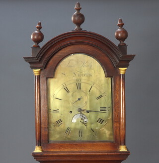 An 18th Century 8 day striking longcase clock, the 30cm arched dial marked James Kirby St Knots with subsidiary second hand and calendar aperture, contained in an oak case with later turned finials and later oak bracket foot to the base, 218cm h x 23cm w x 45cm d, complete with pendulum, key and weights 