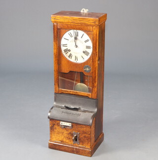 National Time Recorder Company Ltd., a clocking in clock, the 22cm painted dial marked National Time Recorder Company Ltd Aquinas Street, Stamford Street, London ES1, contained in an oak case, complete with pendulum, 2 case keys and an associated winding key (together with various photographs, showing its restoration) 98cm h x 33cm w x 28cm d   