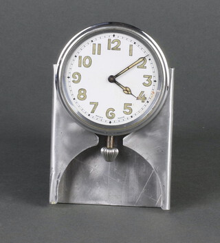A 1940's Swiss car clock with enamelled dial and Arabic numerals contained in an aluminium case 6cm (not running) 