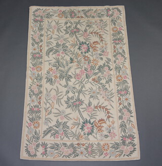 A Kashmiri white and floral patterned panel 165cm x 103cm 
