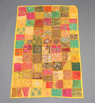An Indian yellow and green ground patchwork wall hanging 147cm x 98cm 