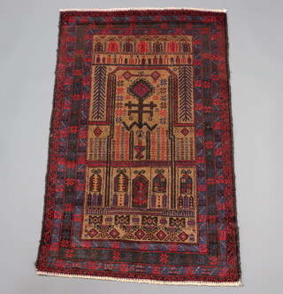 A brown, red and blue ground Belouche prayer rug 137cm x 85cm 