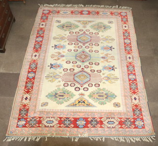 A white, orange, pink and blue ground Caucasian style carpet with 3 medallions to the centre, within a multi row border 319cm x 230cm 