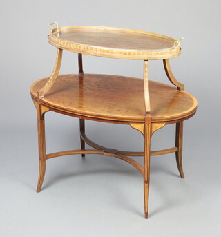 An Edwardian oval inlaid and crossbanded mahogany 2 tier etagere with detachable tray to the top, raised on outswept supports united by an X framed stretcher 183cm h x 88cm w x 56cm d 
