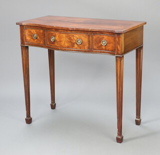 A Georgian style serpentine fronted crossbanded mahogany side table fitted 1 long and 2 short drawers, raised on square tapered supports, spade feet 86cm h x 92cm w x 48cm d 
