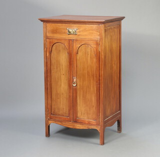 An Art Nouveau mahogany record cabinet, upper section fitted a drawer, base enclosed by panelled doors, raised on square supports 104cm h x 60cm w x 45cm d 