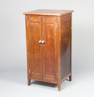An Art Deco marked "Victoria" record cabinet, fitted a drawer and dividers, enclosed by panelled doors 99cm h x 52cm w x 45cm d  