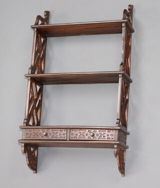 A Chippendale style mahogany 3 tier wall shelf with fret work decoration to the side and 2 drawers 86cm h x 52cm w x 20cm d  