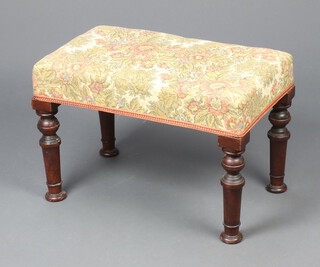 A Victorian mahogany rectangular stool raised on turned supports upholstered in floral material 40cm h x 59cm w x 35cm d 