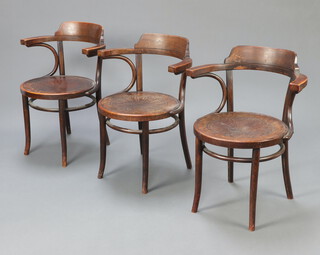 Thonet, three bentwood tub back armchairs, raised on turned supports 81cm h x 62cm w, circular seats 47cm diam., base of each seat labelled Thonet (one label with tear and marked 202) 