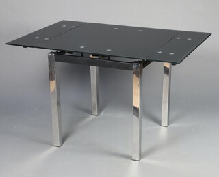 A black and chrome dining table