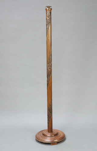 A Chinese carved hardwood standard lamp 160cm x 36cm