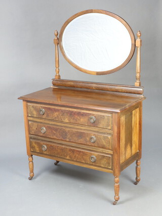 An Edwardian walnut dressing chest with oval bevelled plate mirror above 3 long drawers, raised on turned supports 150cm h x 100cm w x 48cm d (water marks in places)  