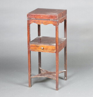A 19th Century square mahogany enclosed wash stand, the hinged lid with bowl recess above under tier, fitted a drawer 81cm h x 33cm w x 33cm d (split to top, scratches and contact marks in places)  
