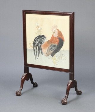 A 1930's oak fire screen with fabric panel of a cockerel contained in a mahogany frame with egg and claw supports 79cm h x 53cm w 