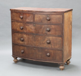 A 19th Century mahogany bow front chest fitted 2 short and 3 long drawers with tore handles raised on bun feet 106cm x 107cm x 50cm, the top has water damage and the veneer is blistering, the beading is missing in places