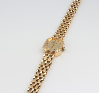 A lady's 9ct yellow gold Churchill quartz wristwatch and bracelet, 16.3 grams gross  