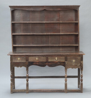 An 18th Century oak dresser of small proportions, the raised back with moulded cornice fitted 3 shelves, the base fitted 3 short and 1 squat drawer with brass pear drop handles, raised on cup and cover supports with box framed stretcher 173cm h x 51cm w x 43cm d 