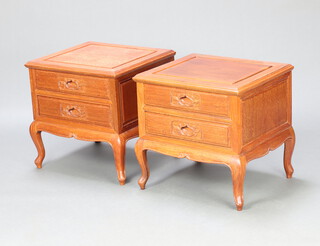 A pair of Chinese carved hardwood bedside chests of 2 drawers, raised on cabriole supports 51cm h x 51cm w x 45cm d 