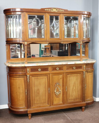A French 19th Century walnut dresser with raised mirrored back fitted a shelf and enclosed by bevel panelled doors above mirrored back recess, having a white and brown veined marble top, the base with 1 short and long drawers above 4 cupboards, raised on square tapered supports 203cm h x 190cm w x 55cm w  