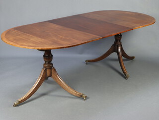 A Georgian style crossbanded mahogany D end dining table with 1 extra leaf, raised on pillar and tripod base with paw feet 75cm h x 99cm w x 170cm l x 226cm with extra leaf  