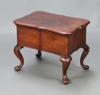 An Eastern hardwood sewing box of serpentine outline with hinged lid, interior fitted a tray, raised on cabriole supports 40cm h x 51cm w x 36cm d 